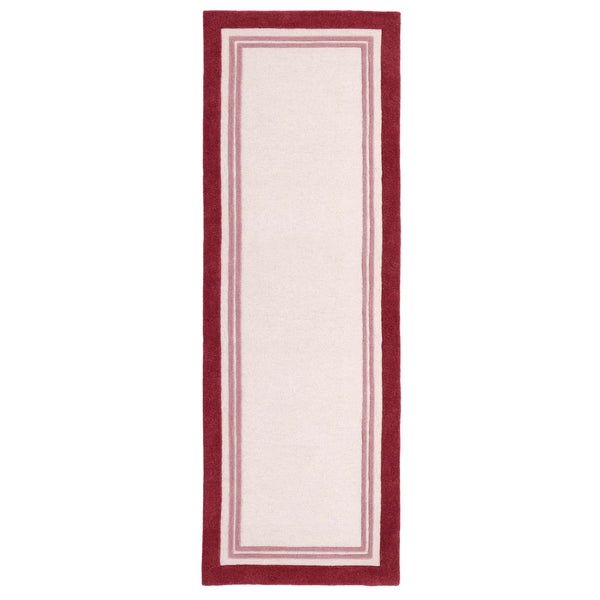 Piper Rug Runner Raspberry- a 100% wool runner featuring a pink border.