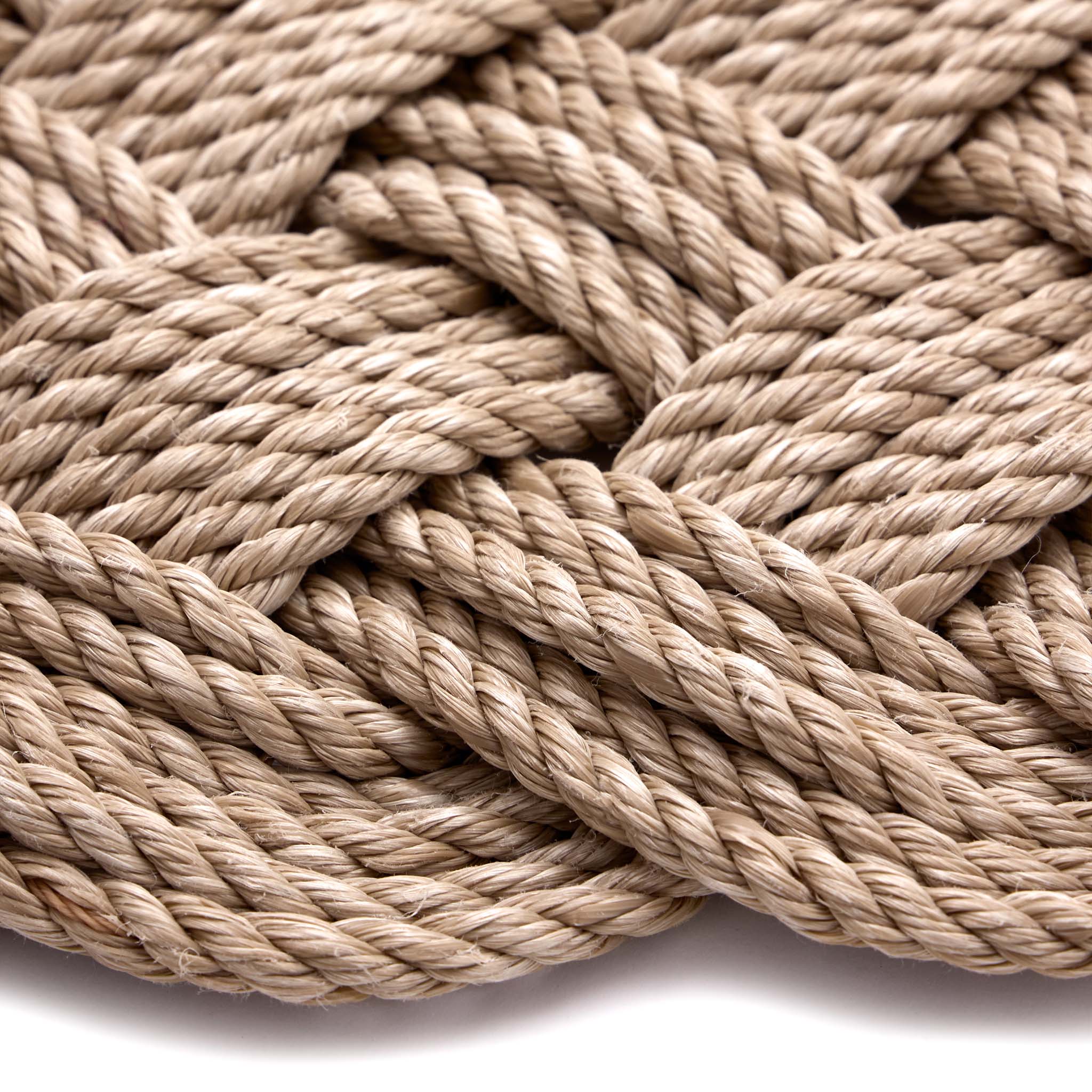 Lovers Knot Outdoor Sand- featuirng a knotted pattern in beige.