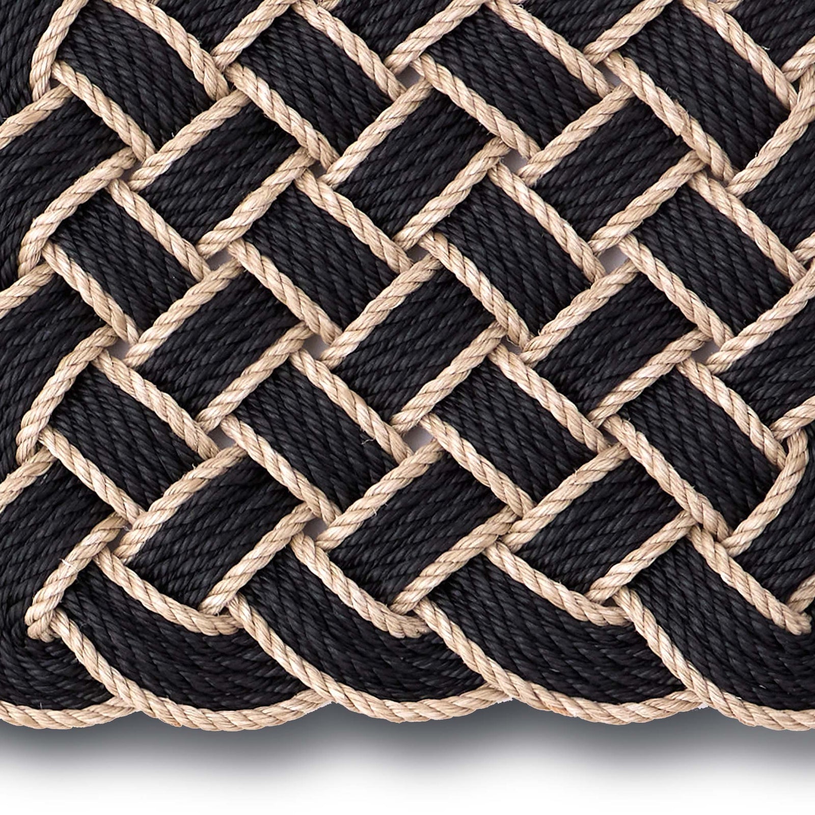 Lovers Knot black outdoor mat- featuring a rope design.
