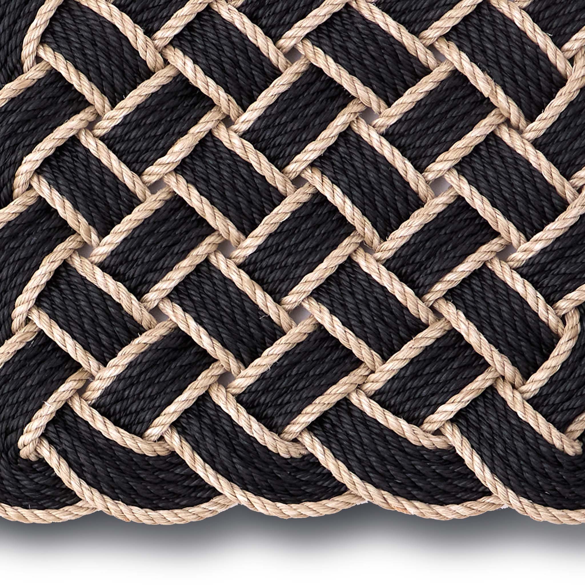 Lovers Knot black outdoor mat- featuring a rope design.