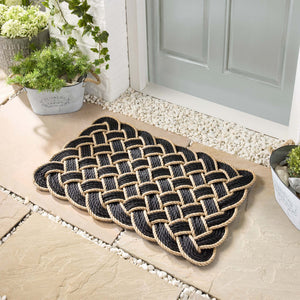 Lovers Knot black outdoor mat- featuring a rope design.