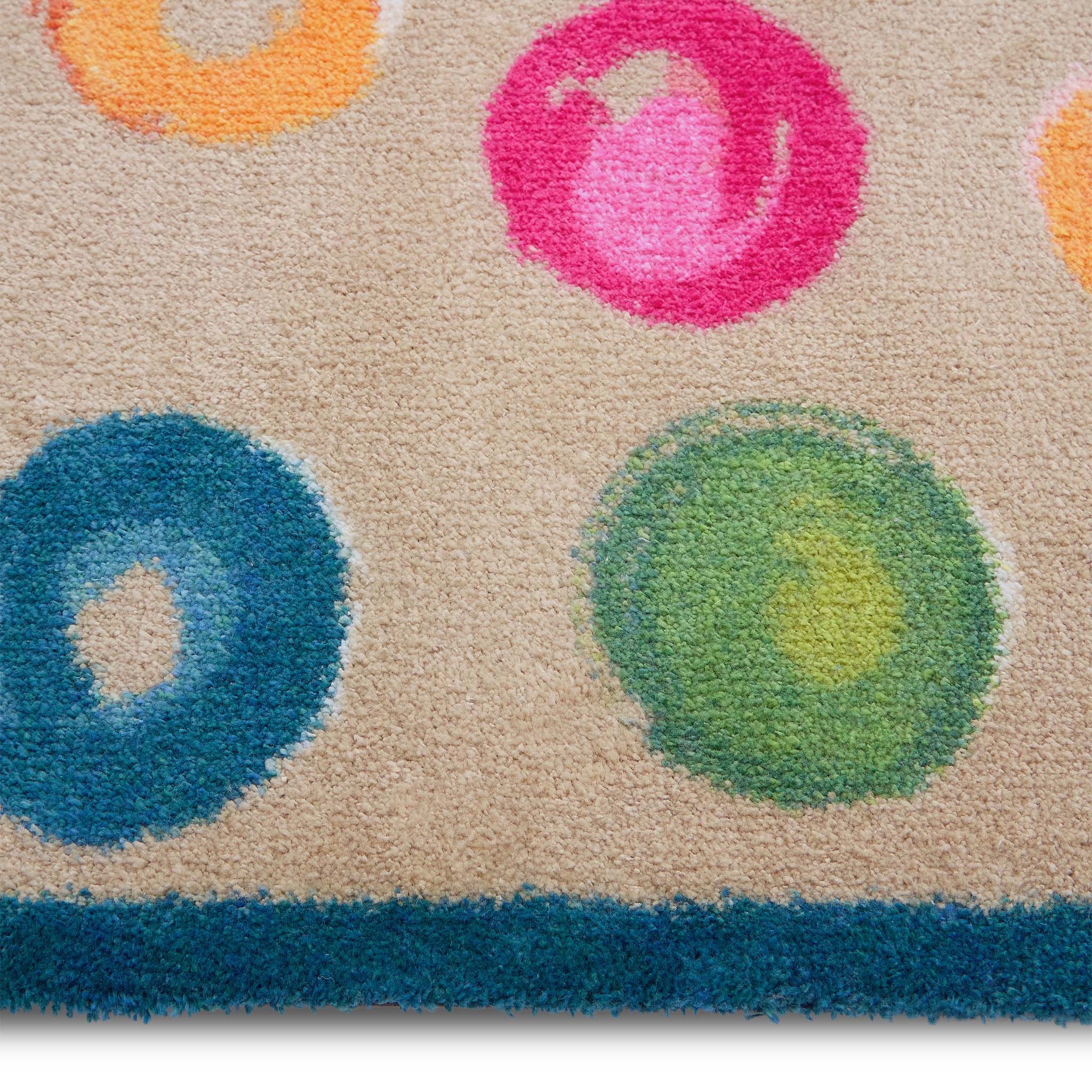Painted Spots Multi Charity Runner- 100% recycled cotton doormat featuring painted spots.