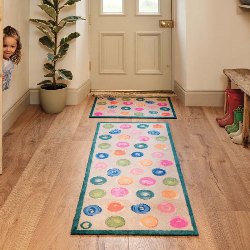 Painted Spots Multi Charity Runner- 100% recycled cotton doormat featuring painted spots.