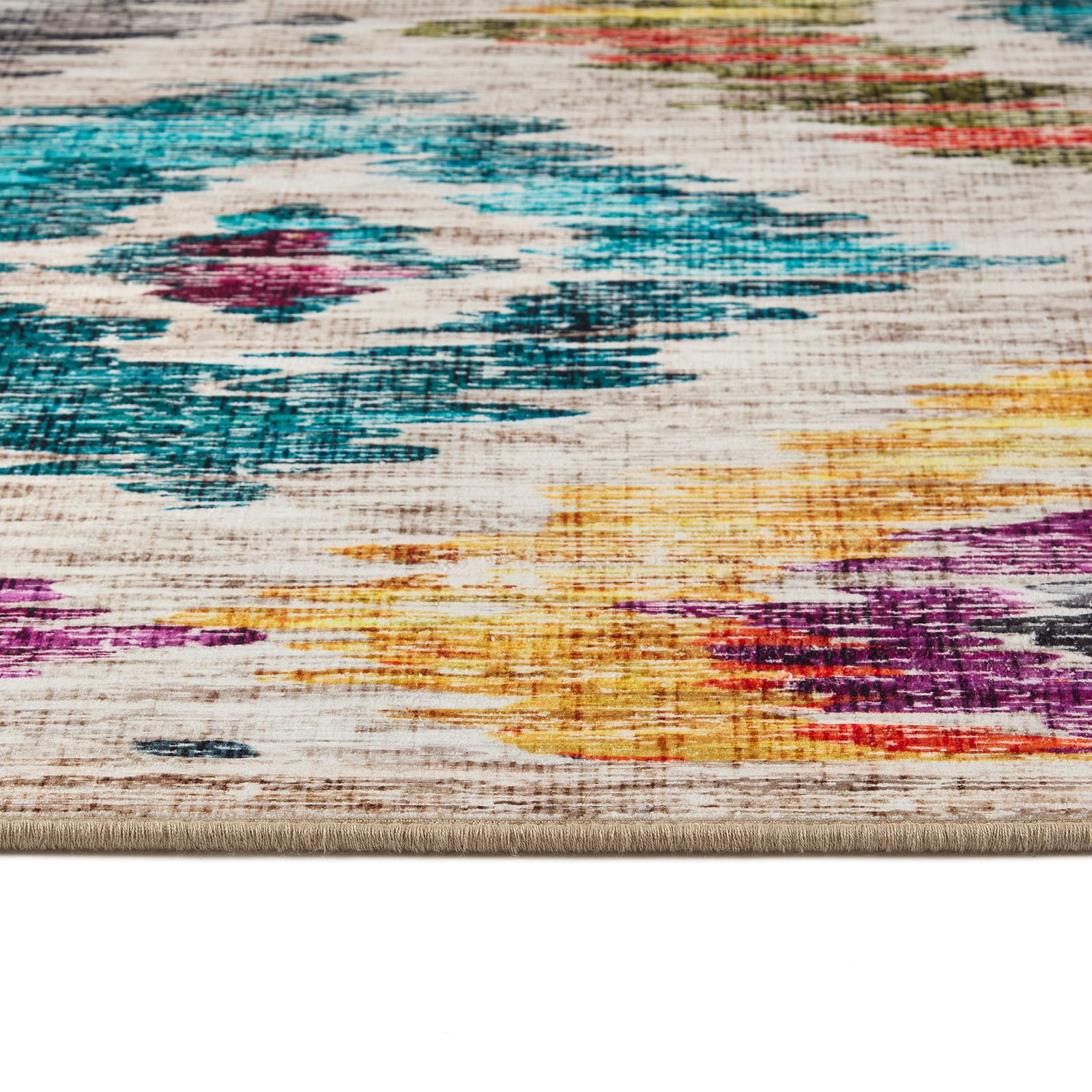 Painted Ikat Eco-Washable Rug- 100% recycled content rug featuring a colourful geometric pattern.