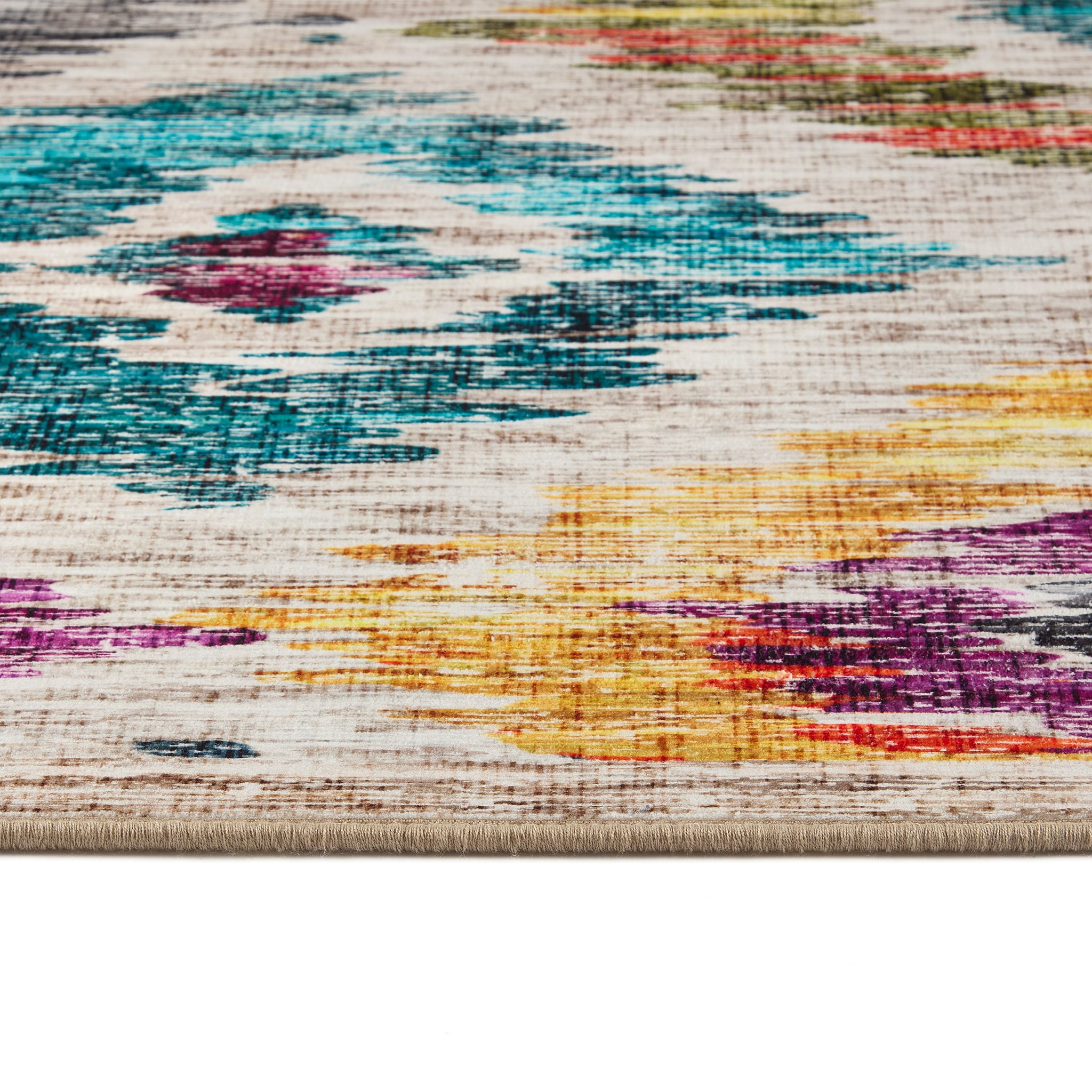 Painted Ikat Eco-Washable Rug- 100% recycled content rug featuring a colourful geometric pattern.