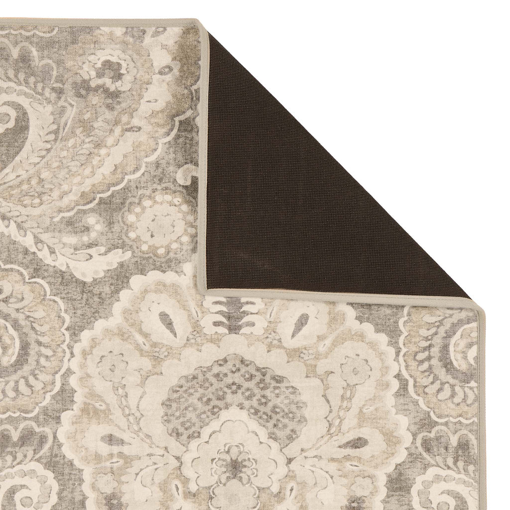 Close-up of Paisley Tapestry Linen Eco-Washable Rug showing backing.