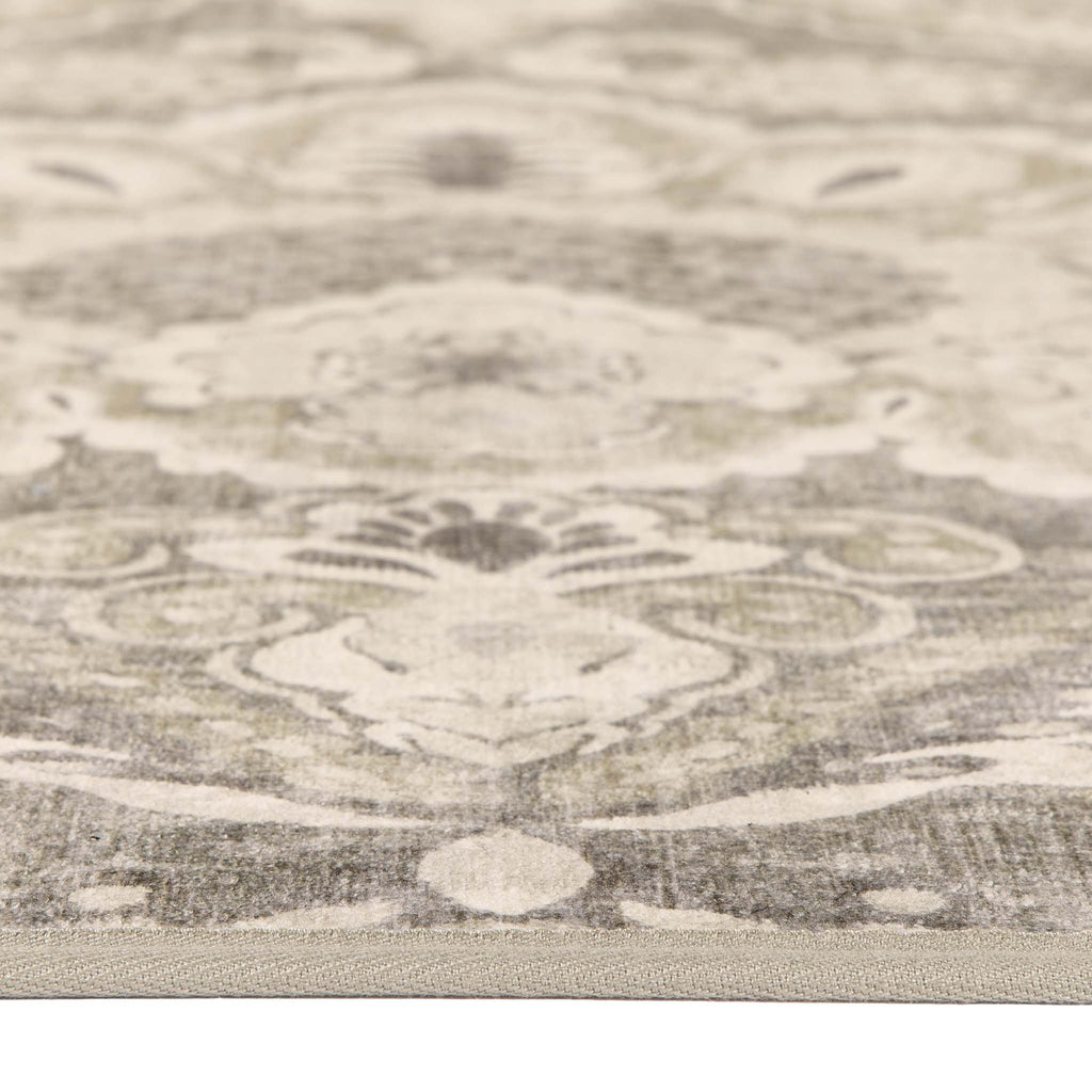 Close-up of Paisley Tapestry Linen Eco-Washable Rug showing pile height. 