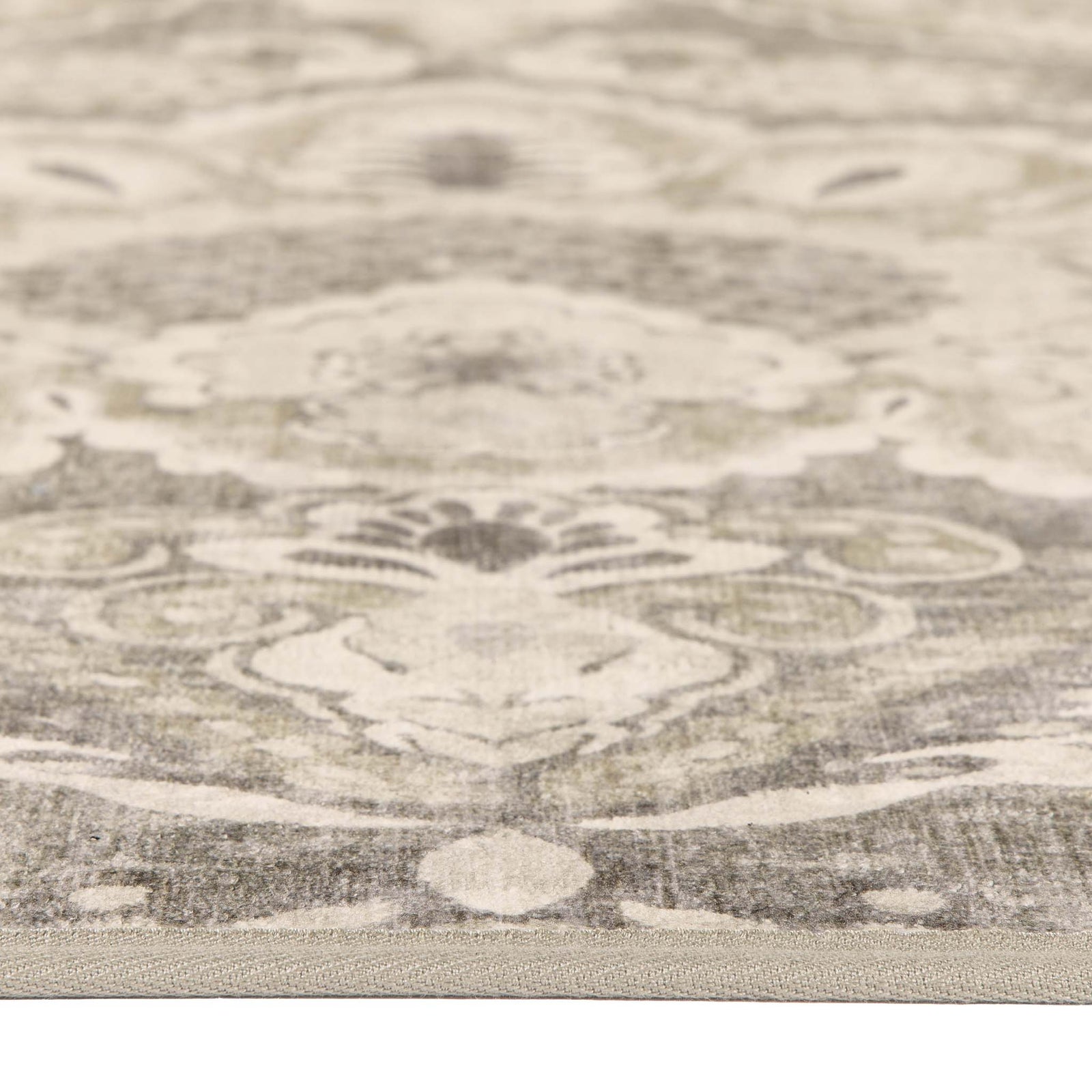 Close-up of Paisley Tapestry Linen Eco-Washable Rug showing pile height. 