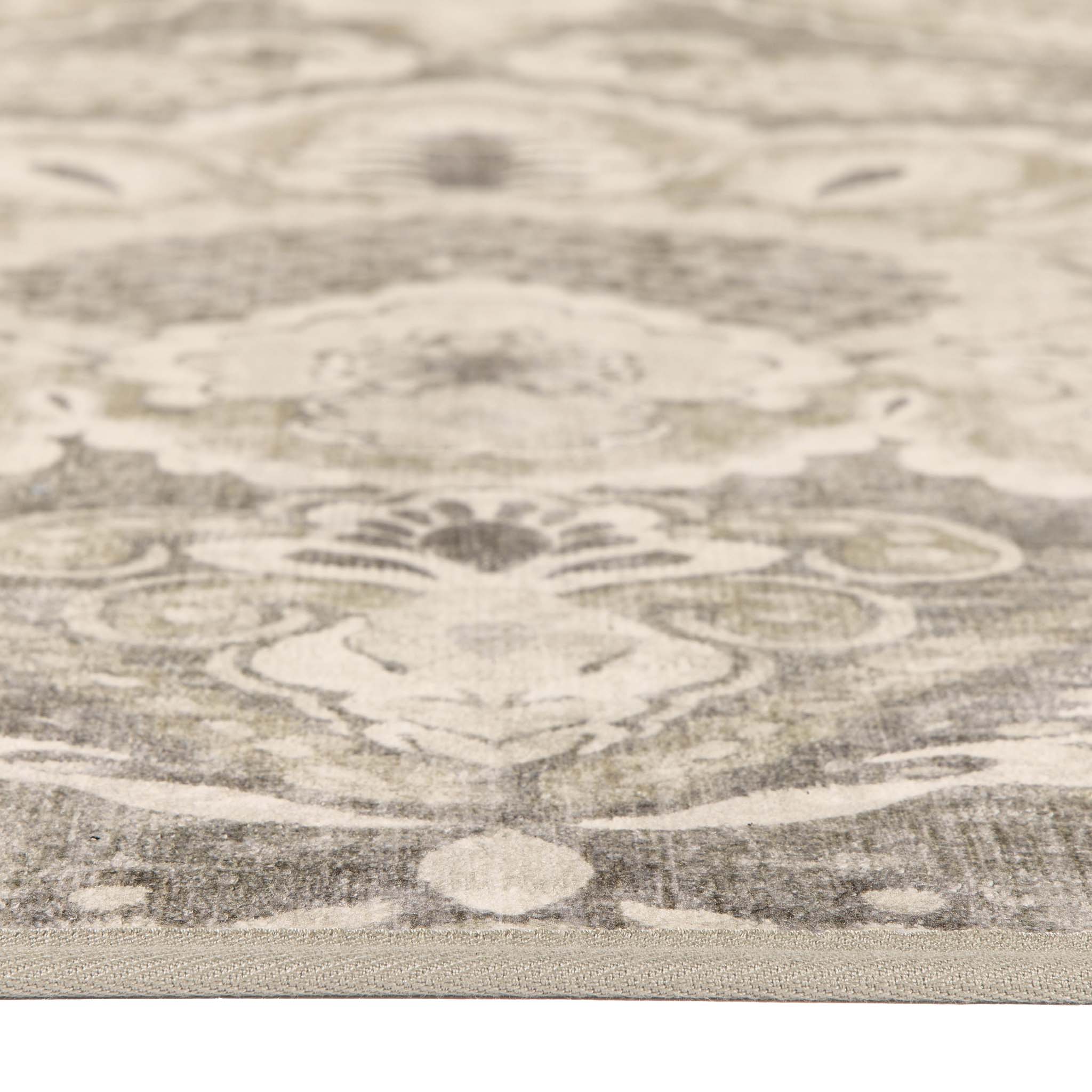 Close-up of Paisley Tapestry Linen Eco-Washable Rug showing pile height. 
