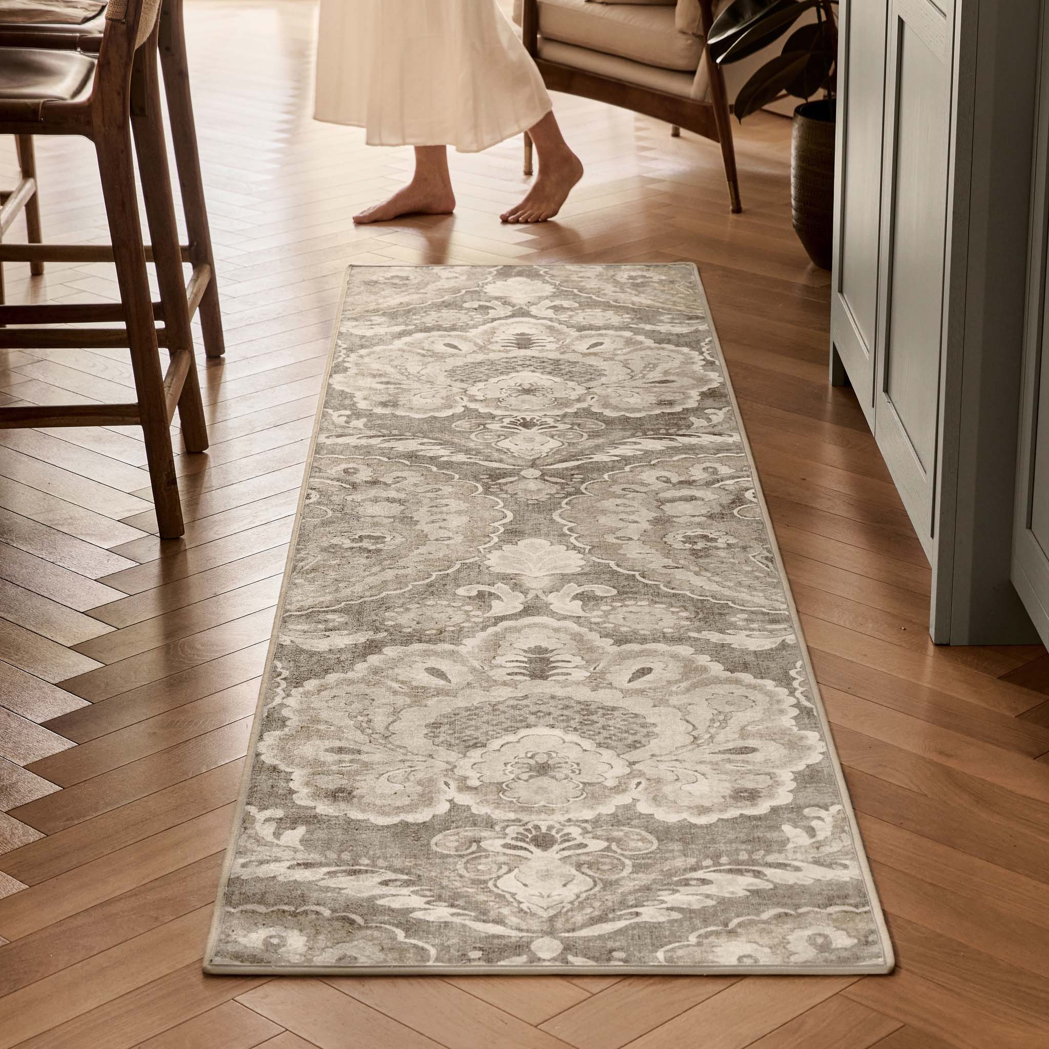 Paisley Tapestry Linen Eco-Washable Runner with a paisley design, styled on wooden flooring.