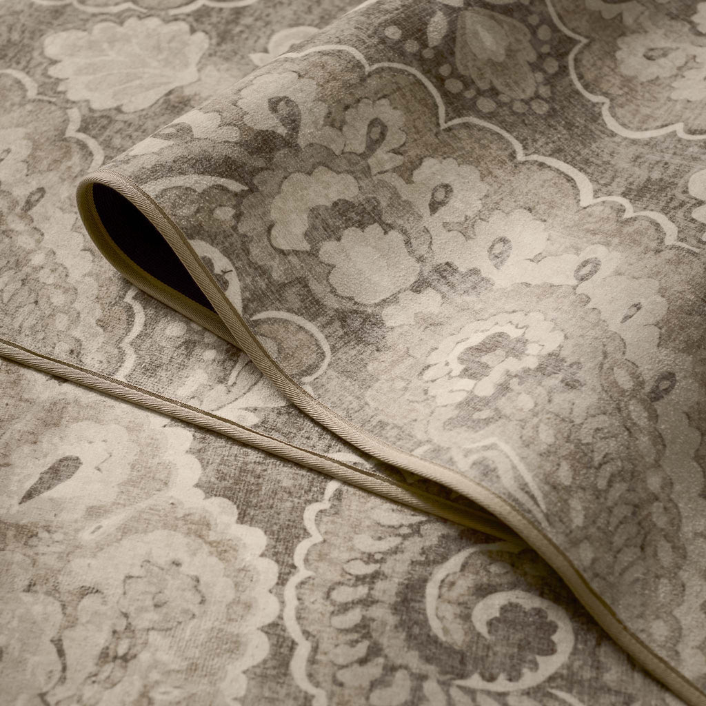 Close-up of Paisley Tapestry Linen Eco-Washable Rug showing paisley design.