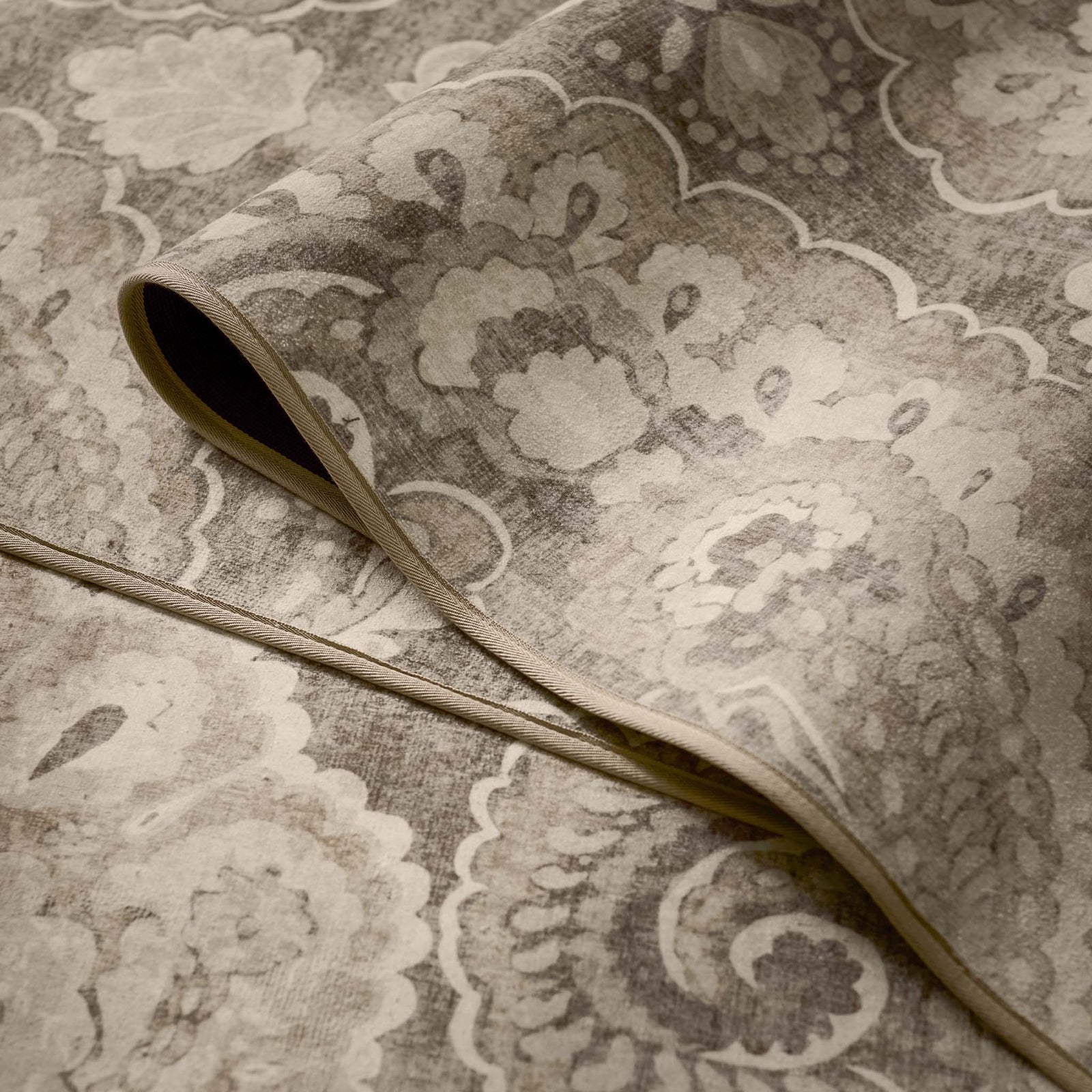 Close-up of Paisley Tapestry Linen Eco-Washable Rug showing paisley design.