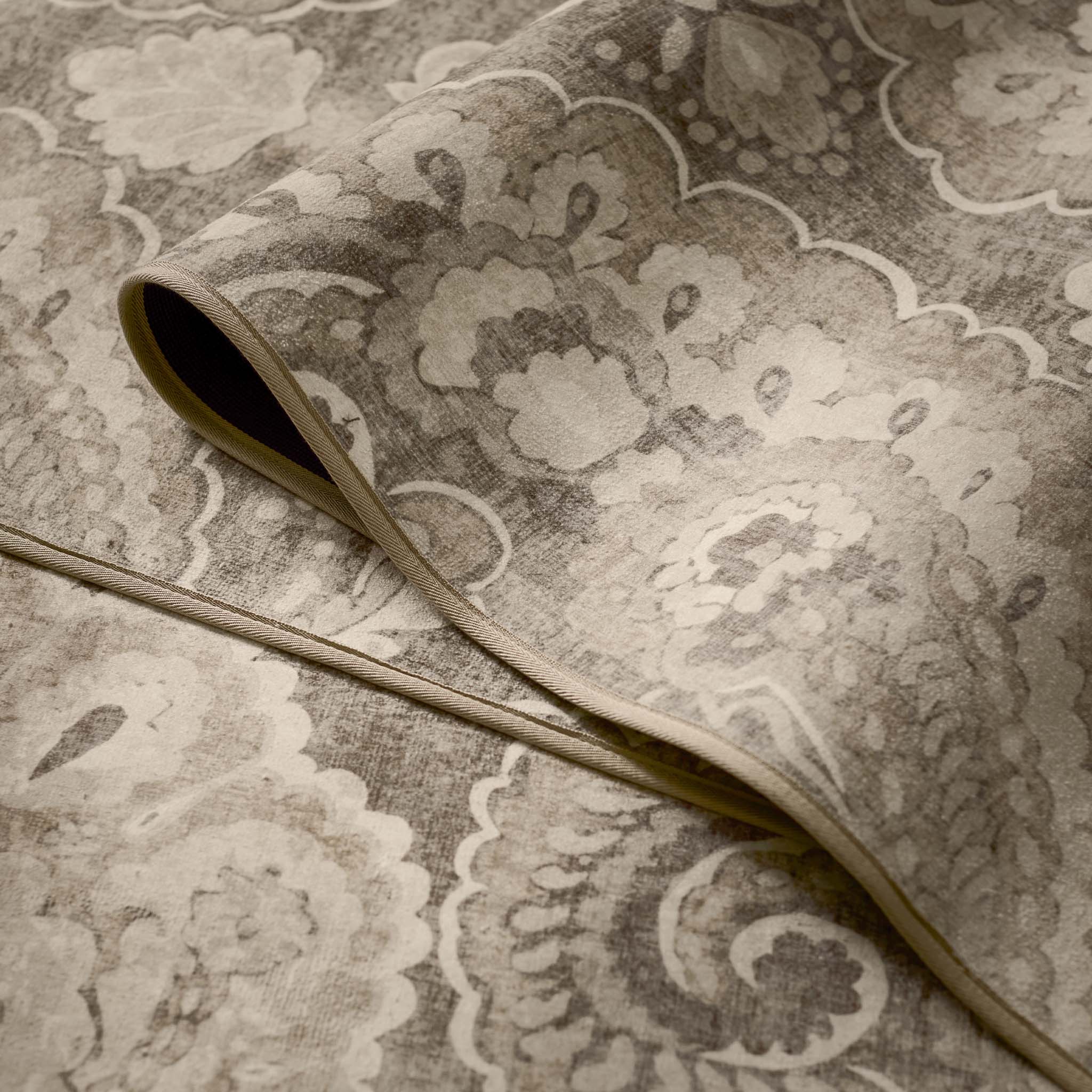 Close-up of Paisley Tapestry Linen Eco-Washable Rug showing paisley design.