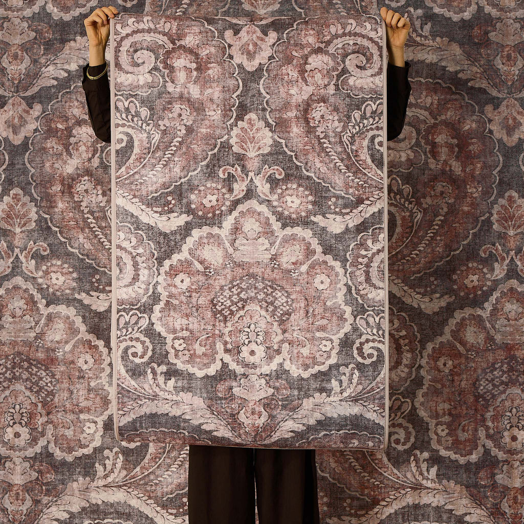 Paisley Tapestry Smoke Eco-Washable Rug with a paisley pattern.
