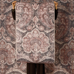 Paisley Tapestry Smoke Eco-Washable Rug with a paisley pattern.