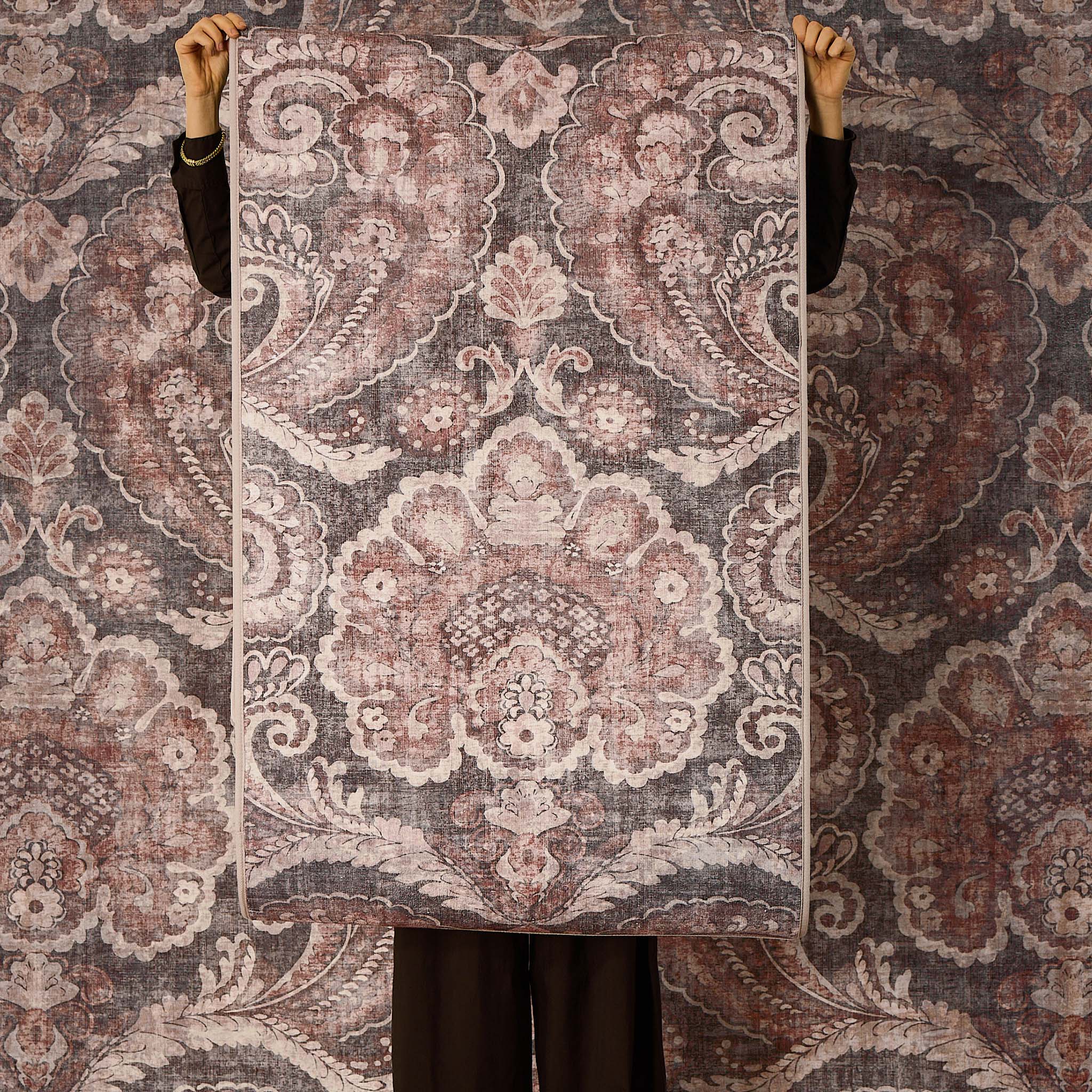 Paisley Tapestry Smoke Eco-Washable Rug with a paisley pattern.