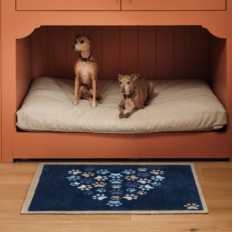 Paws For Love Blue Doormat- 100% recycled cotton doormat featuring multi-directional paws prints in the shape of a heart.