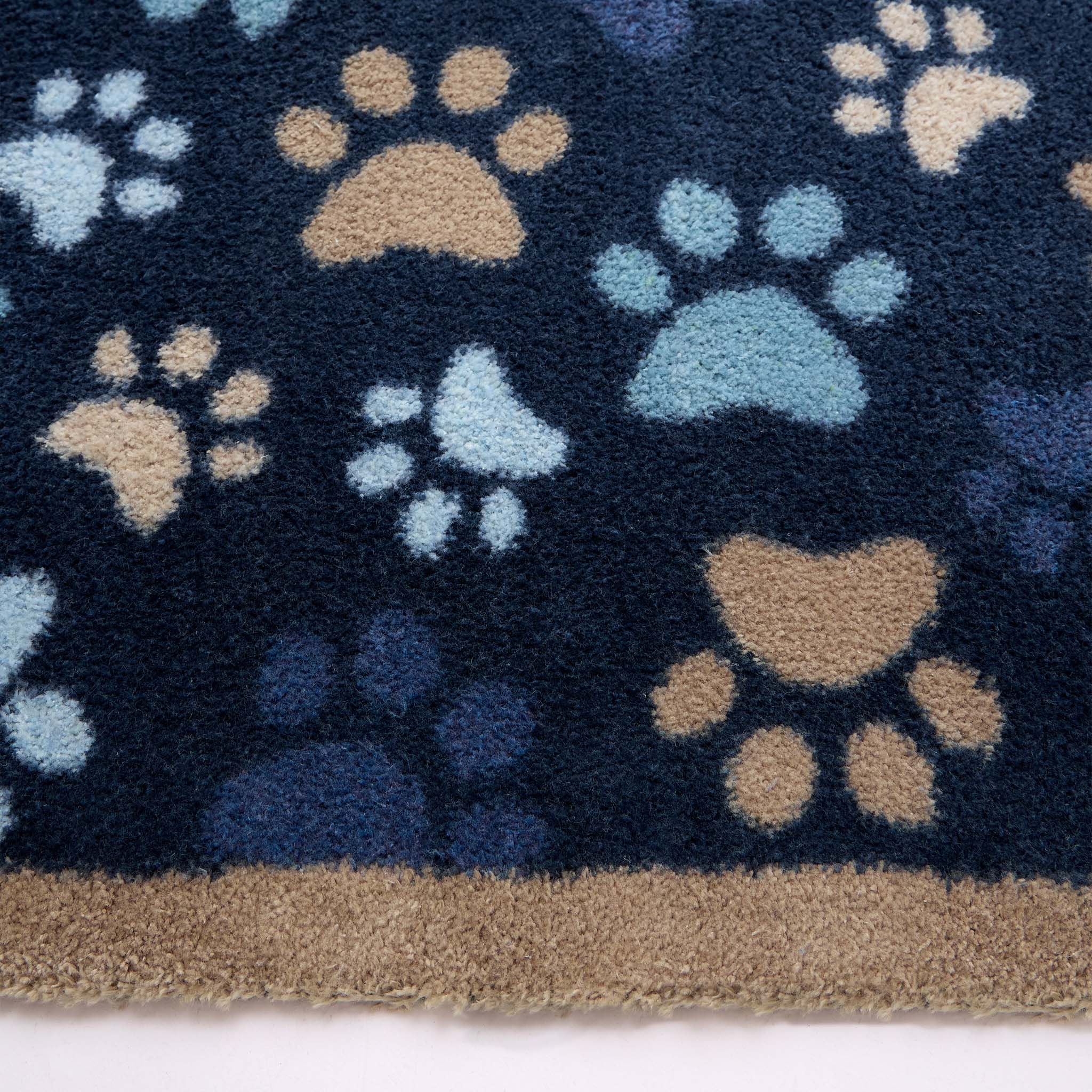 Paws For Love Blue Washable Runner with a multi-directional paw print pattern.