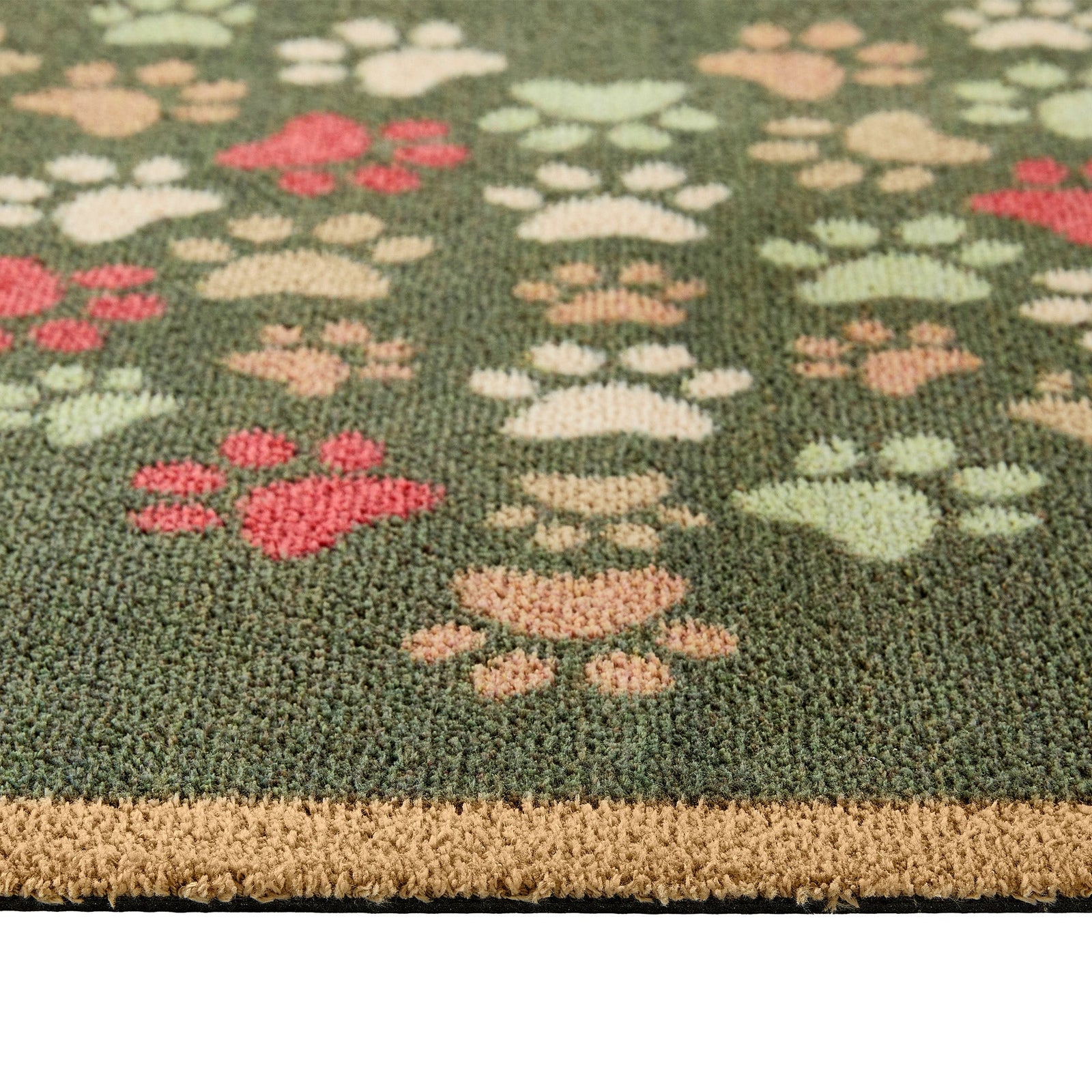  Paws for Love Washable Runner in Green- a 100% recycled cotton runner featuring multi-coloured paw prints in a multi-directional pattern.