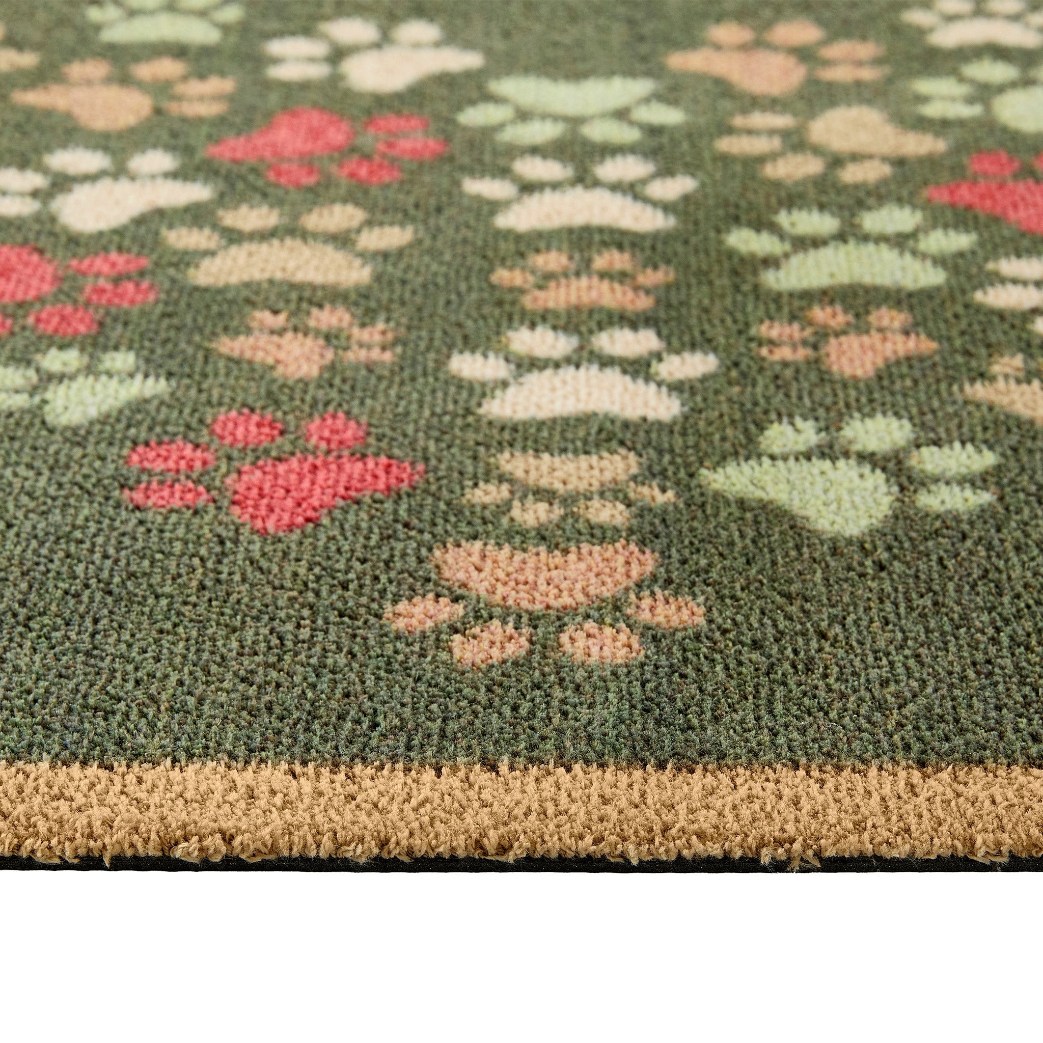  Paws for Love Washable Runner in Green- a 100% recycled cotton runner featuring multi-coloured paw prints in a multi-directional pattern.