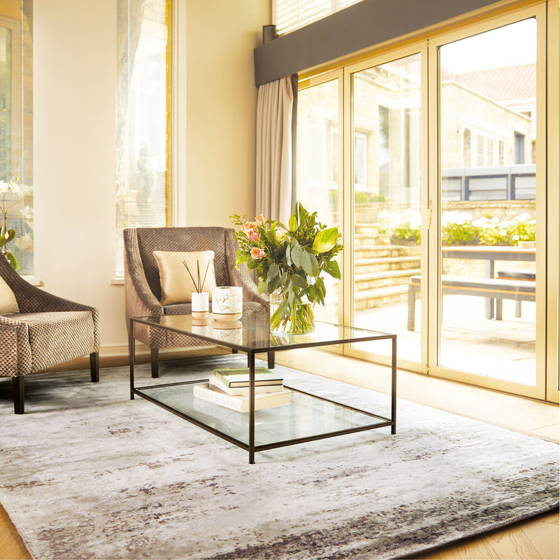 Persia Rug Fossil Cloud Rug made from 100% viscose, featuring a diamond pattern in the centre.