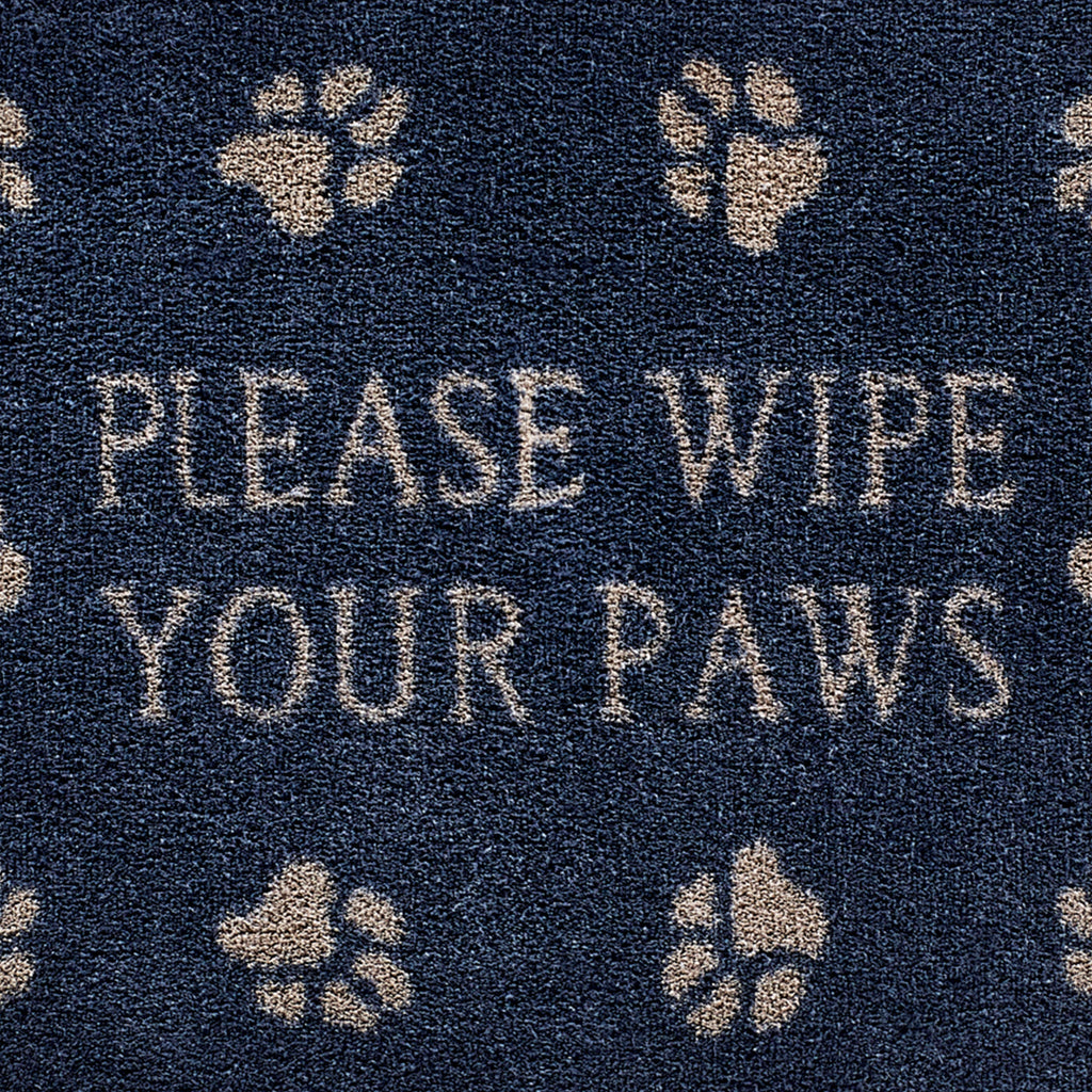 Close up image of the please wipe your paws text and pattern on a navy Pet 10 washable doormat from Hug Rug