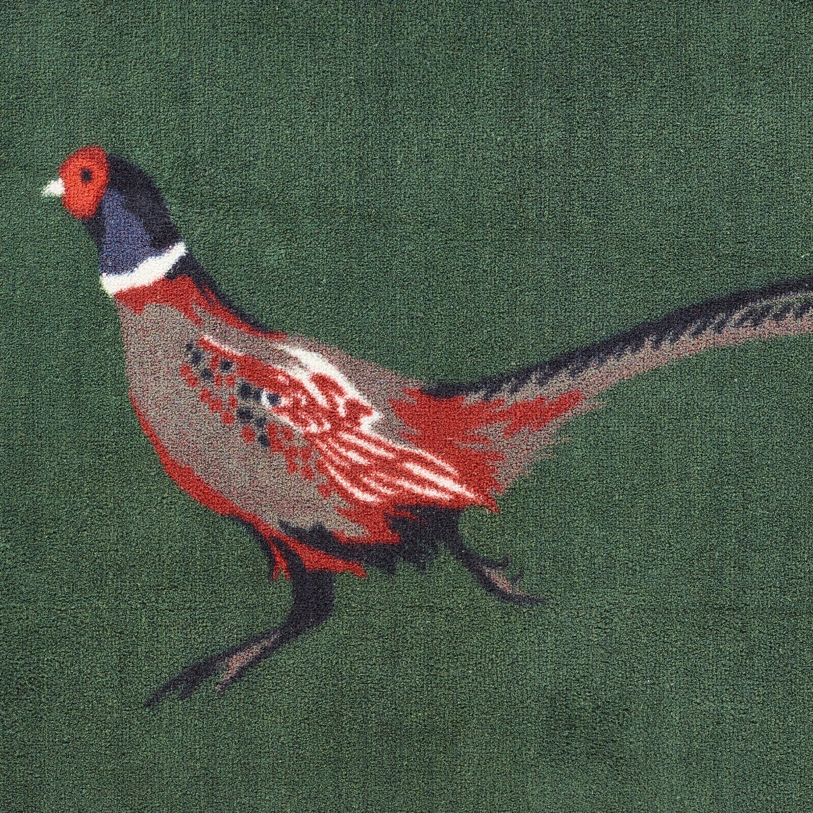 Pheasant Green 2 Washable Runner in green- a 100% recycled cotton runner featuring a pheasant facing left with a trail of white hearts.
