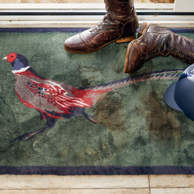 Pheasant Green 2 Washable Doormat with Pheasant design, styled in a doorway.