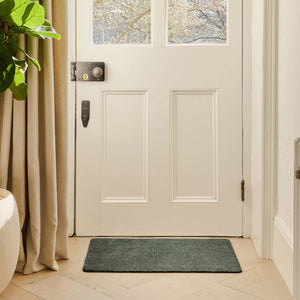 Plain Fleck Sage Green Doormat - a 100% recycled material doormat featuring a green fleck design. 