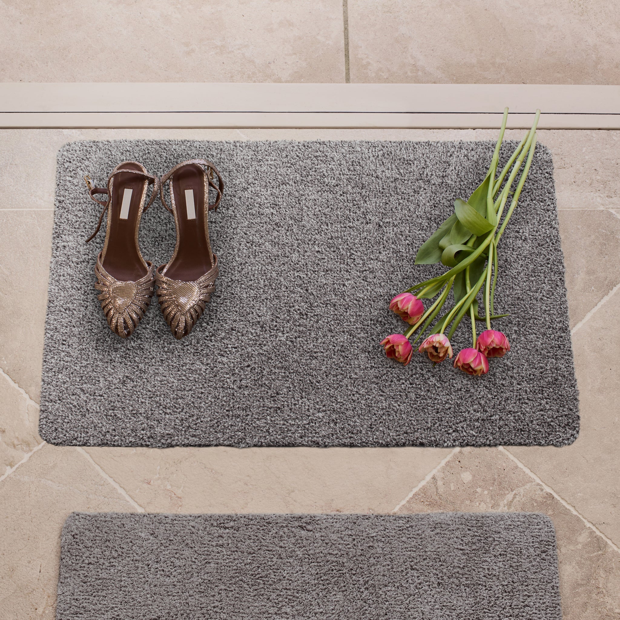 Plain Fleck Light Grey Runner- a 100% recycled material runner in a blend of mid grey, light grey, black, and white flecks.
