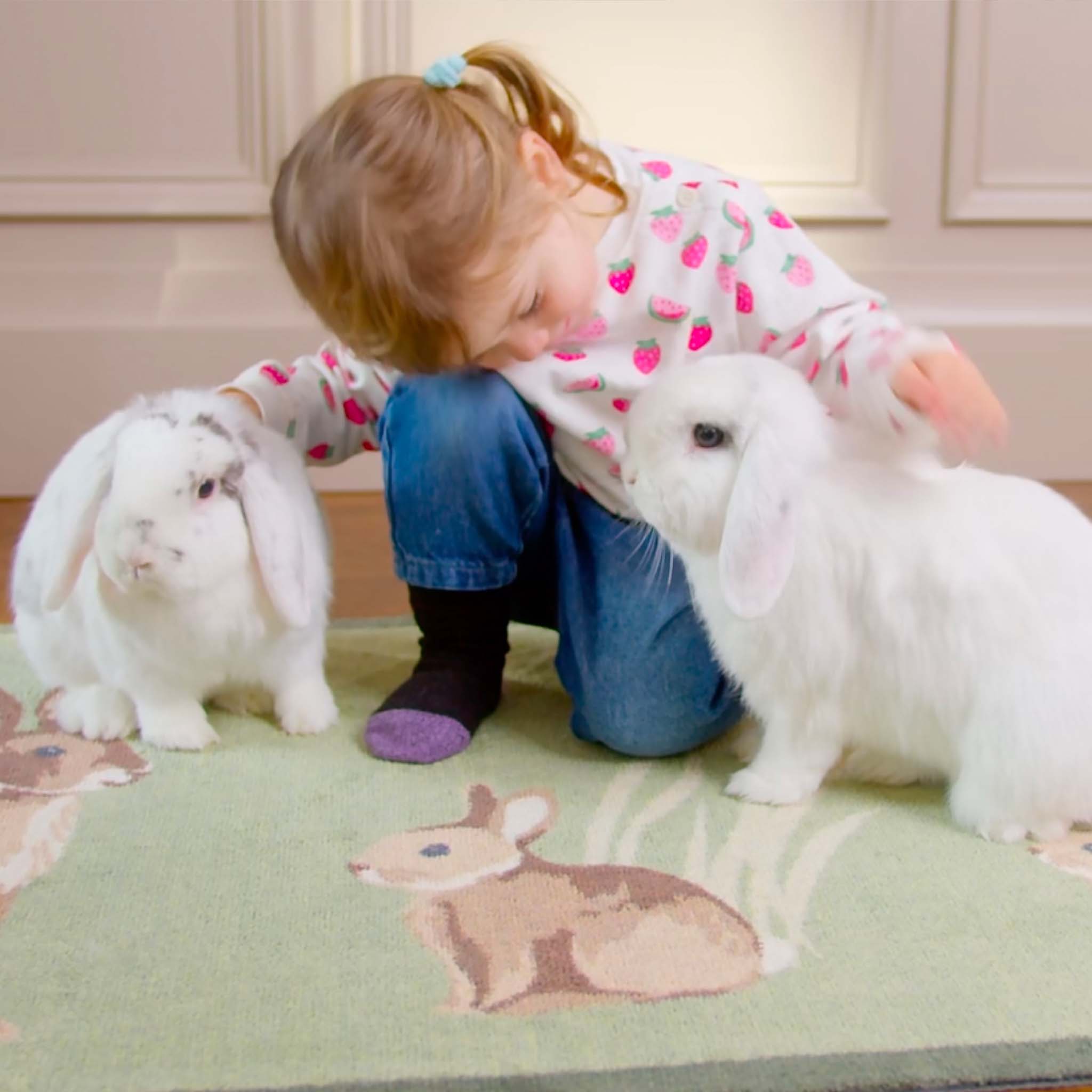 Rabbit 1 Green Washable Doormat made from 100% recycled materials, featuring two rabbits sitting in the green reeds.