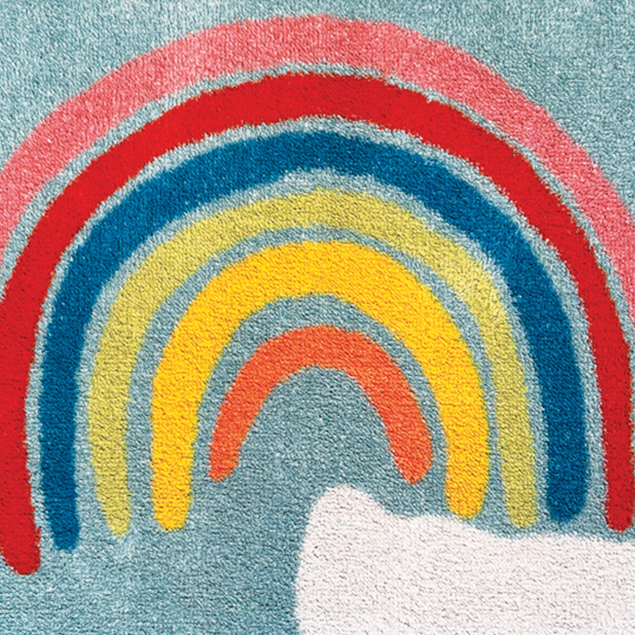 Rainbow 2 Charity Doormat- a 100% cotton doormat in sky blue featuring a rainbow and clouds design. 