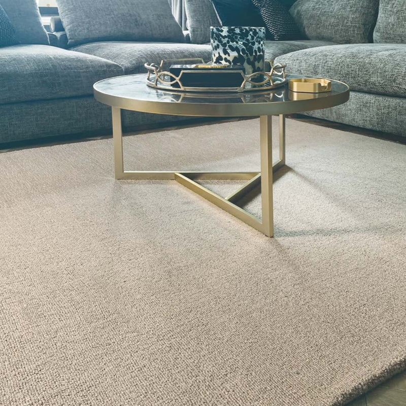 Reef Beige Rug made from 100% recycled materials in a solid beige colour.