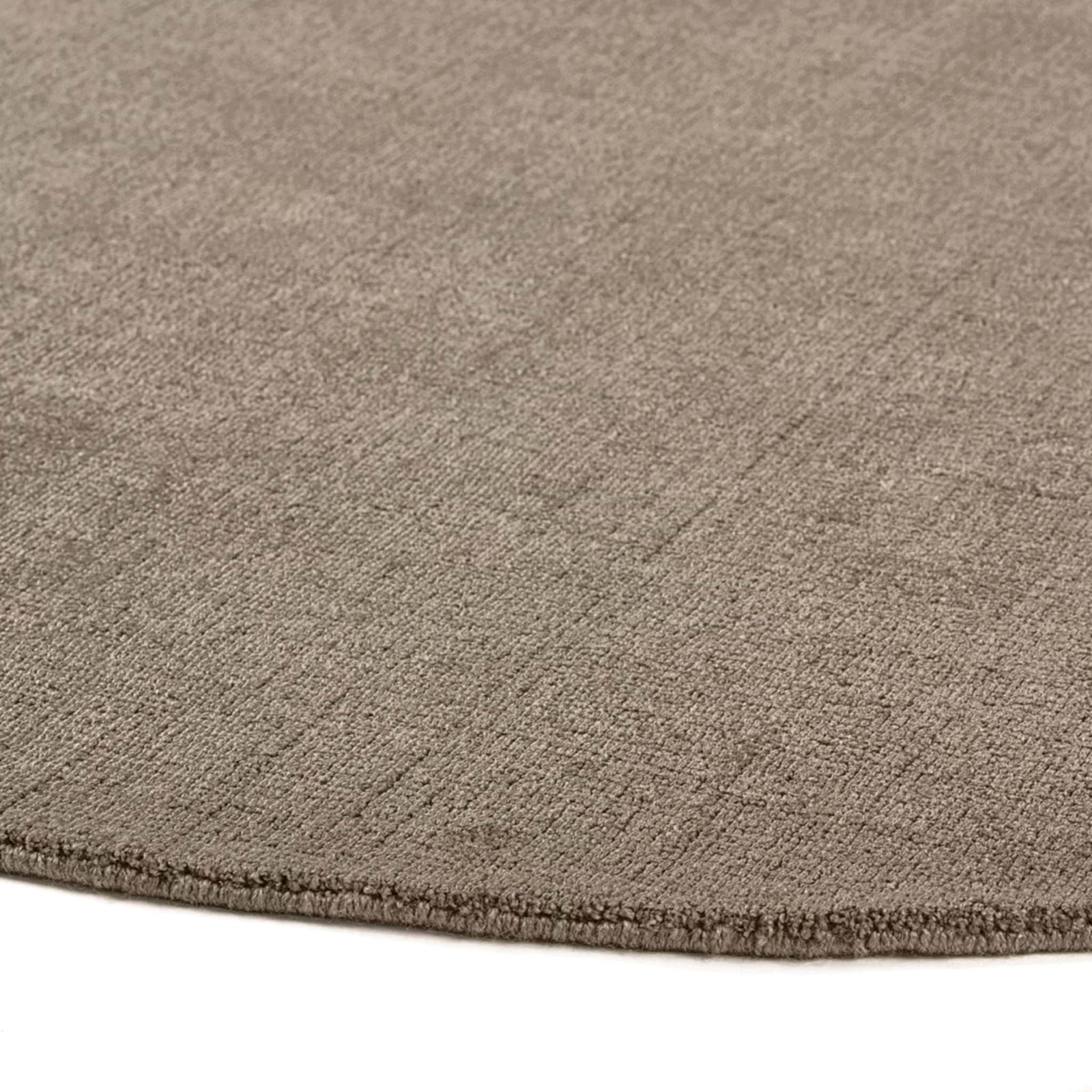 Reef Mink Rug - a 100% recycled material rug featuring a brown textured pattern.