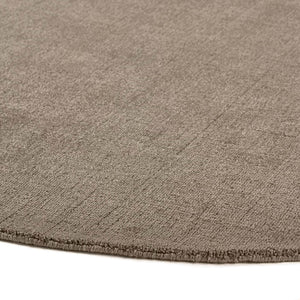 Reef Mink Rug - a 100% recycled material rug featuring a brown textured pattern.