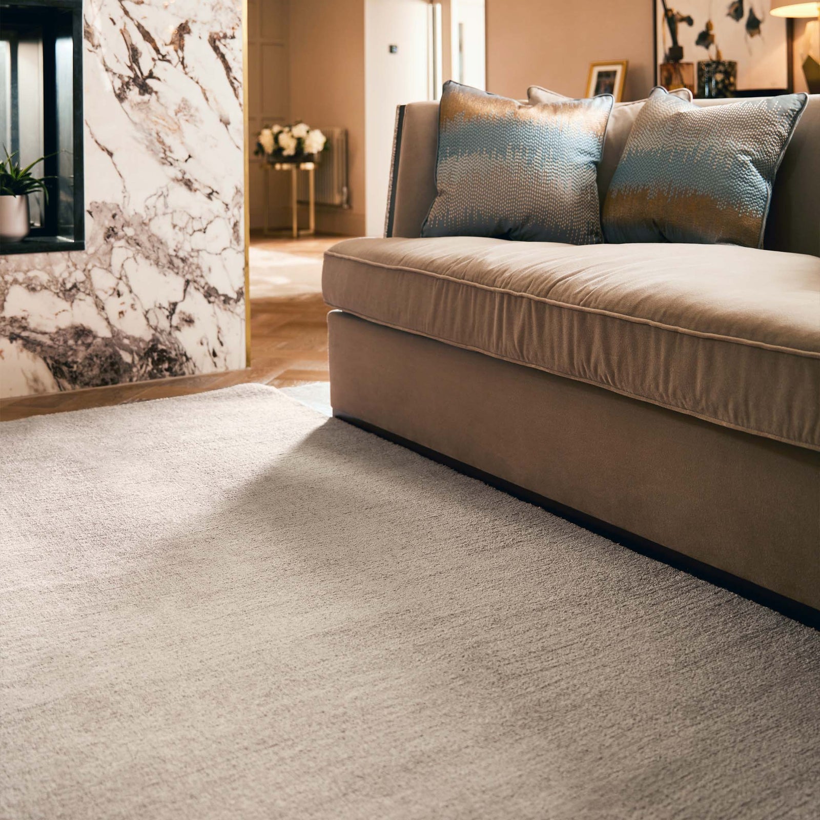 Reef Mink Rug - a 100% recycled material rug featuring a brown textured pattern.