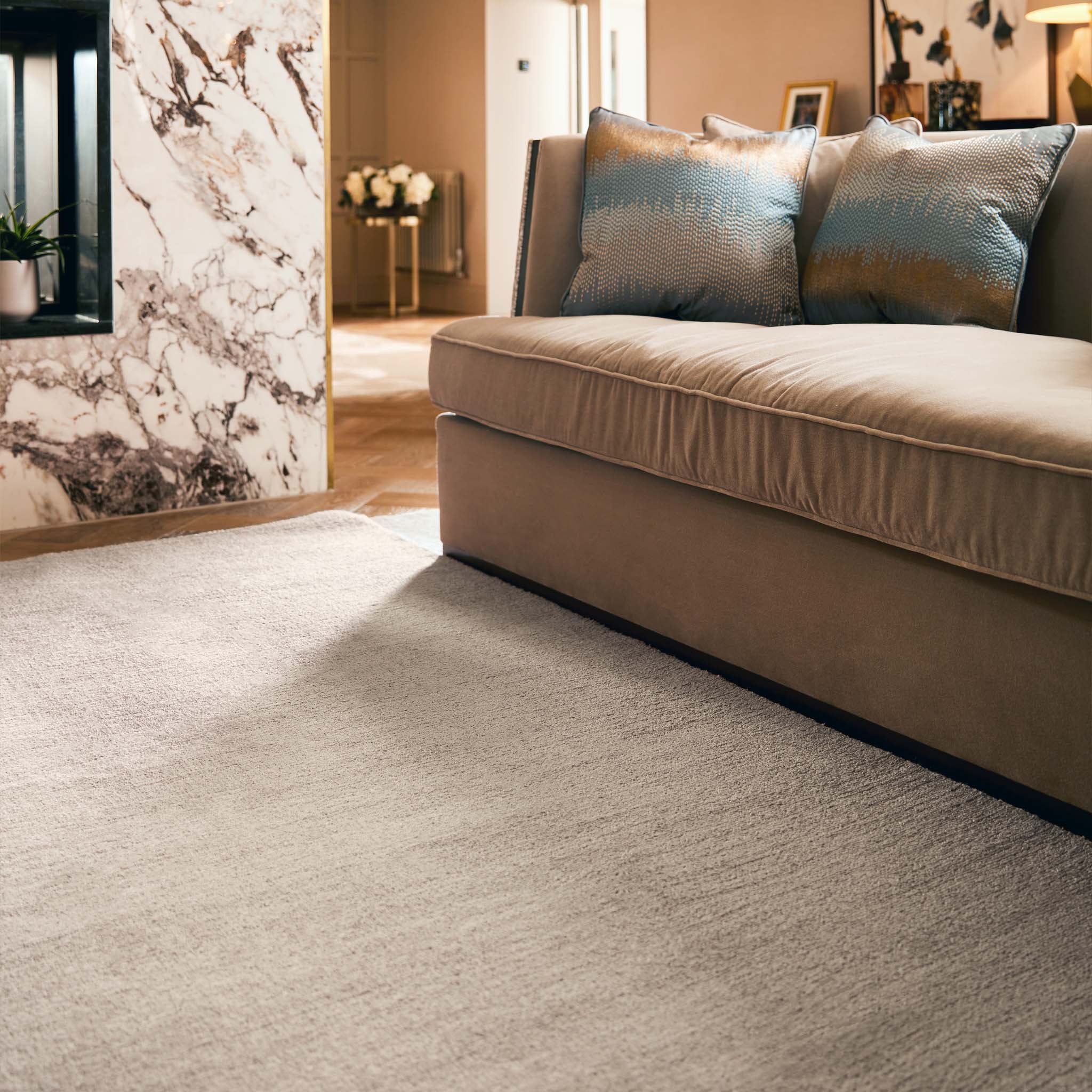 Reef Mink Rug - a 100% recycled material rug featuring a brown textured pattern.