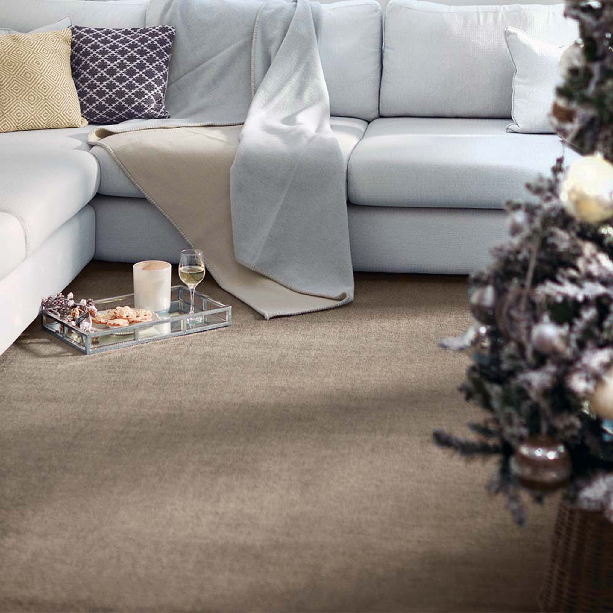Reef Mink Rug - a 100% recycled material rug featuring a brown textured pattern.