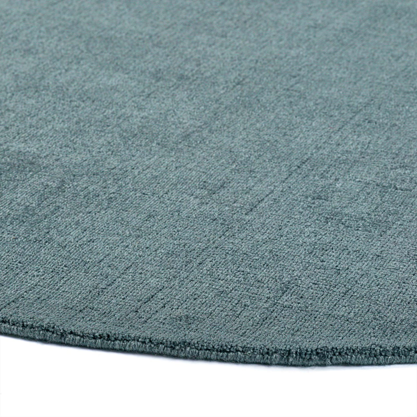 Reef Petrol Blue Rug - a 100% recycled material rug featuring a blue textured pattern.