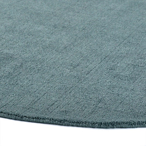 Reef Petrol Blue Rug - a 100% recycled material rug featuring a blue textured pattern.