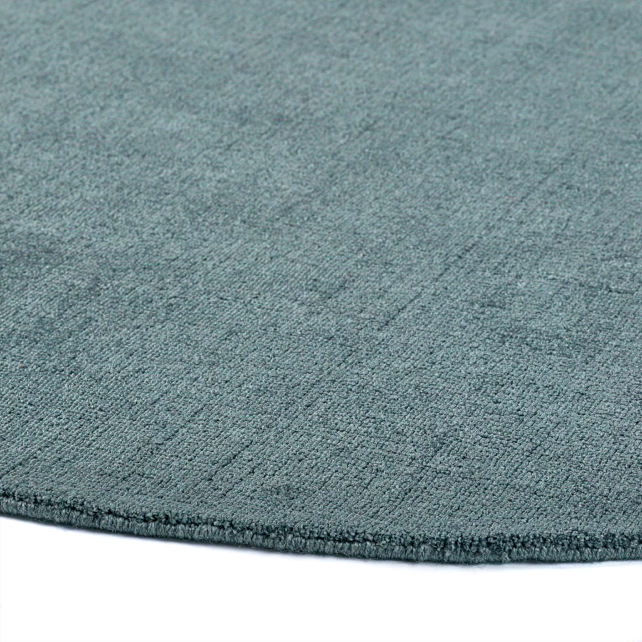Reef Petrol Blue Rug - a 100% recycled material rug featuring a blue textured pattern.