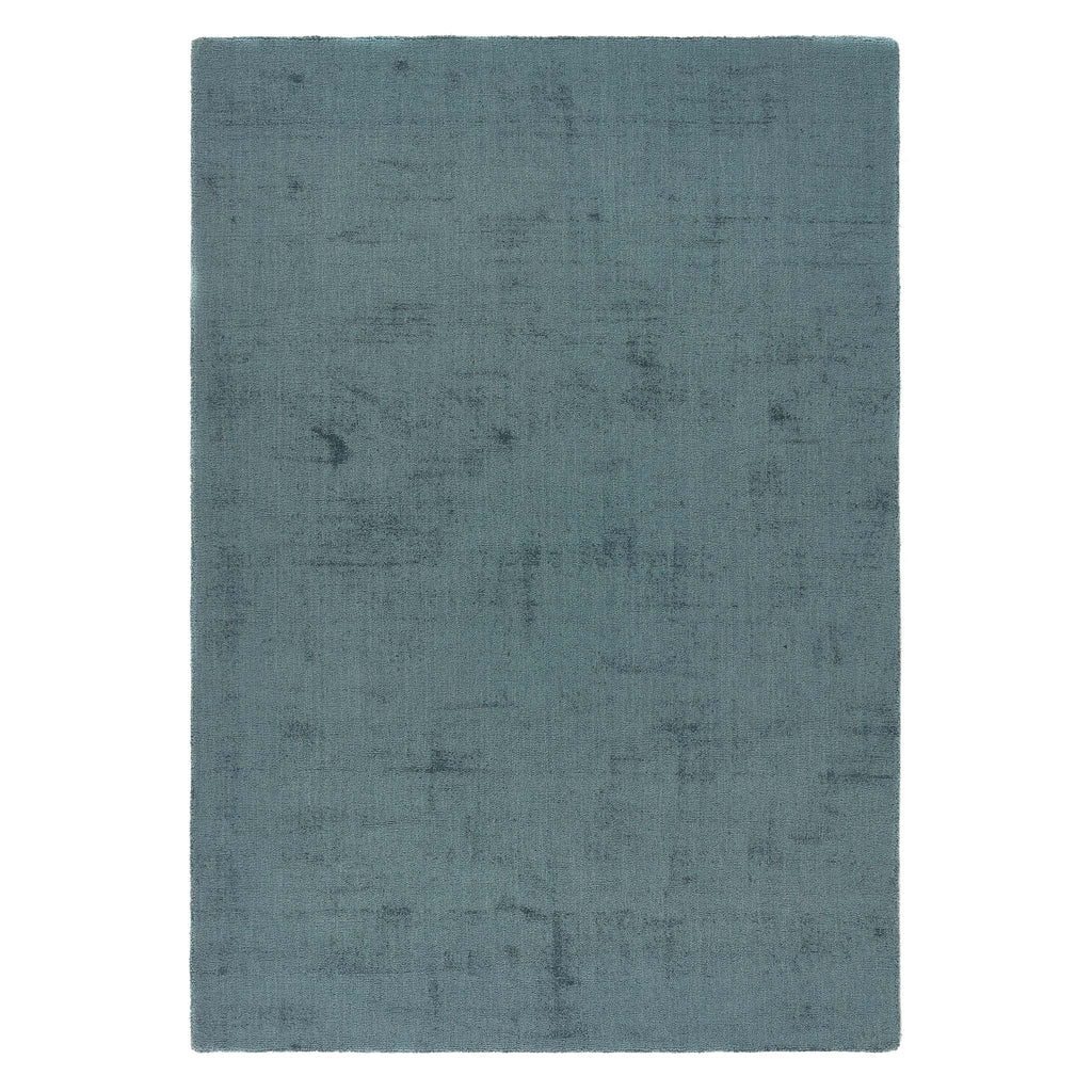 Reef Petrol Blue Rug - a 100% recycled material rug featuring a blue textured pattern.
