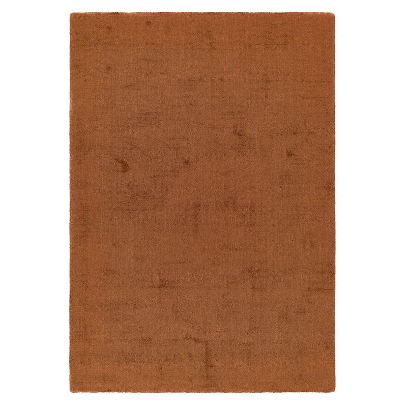 Reef Rust Rug - a 100% recycled material rug featuring an orange/red textured pattern.