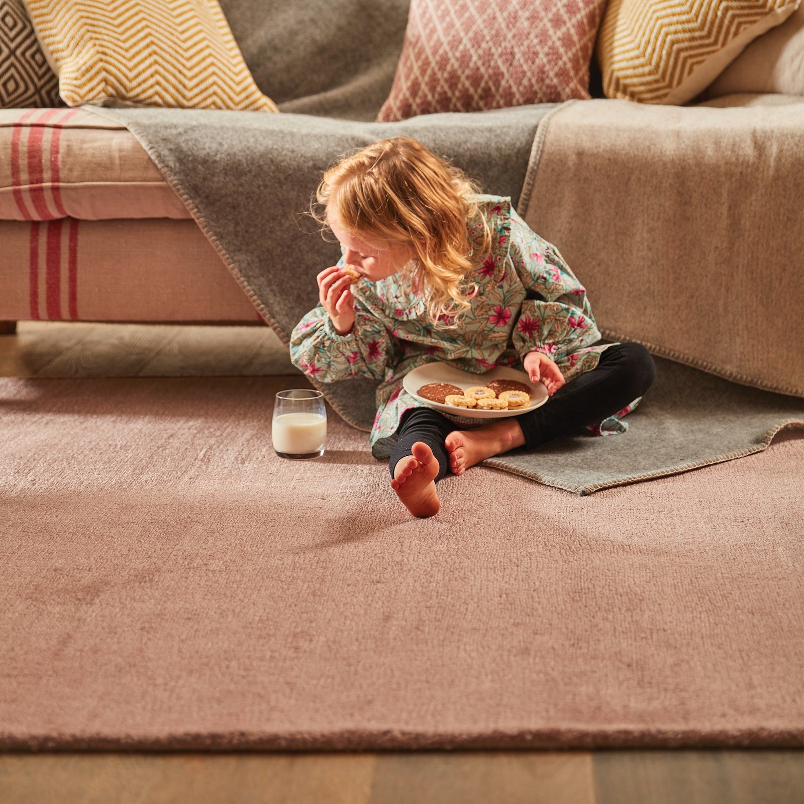 Reef Blush Rug made from 100% recycled materials in a solid pink colour. 