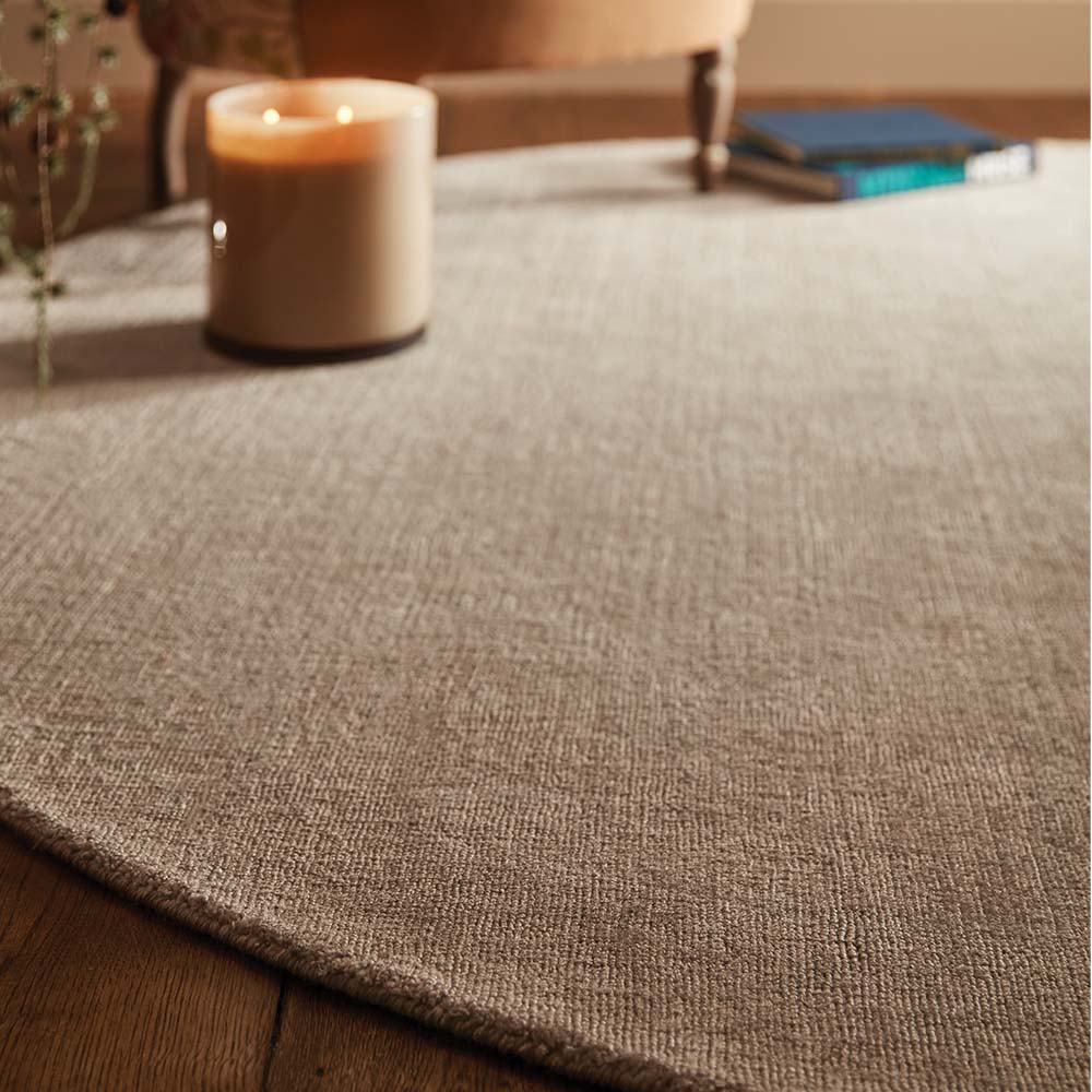 Reef Beige Rug made from 100% recycled materials in a solid beige colour.