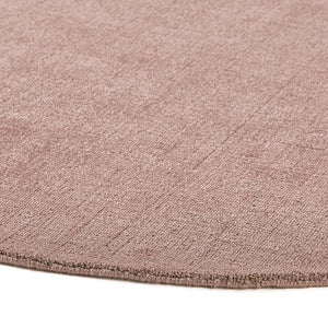 Reef Blush Rug made from 100% recycled materials in a solid pink colour. 