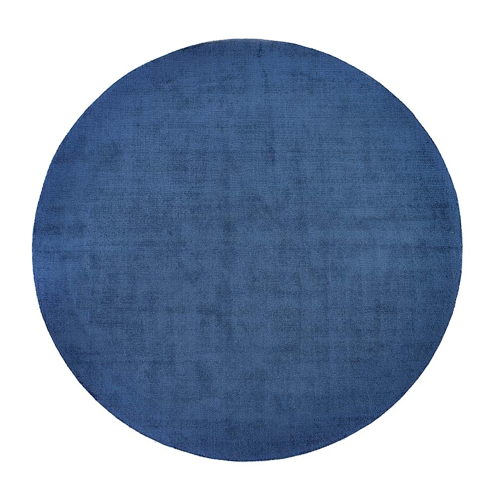 Reef Navy Rug made from 100% recycled materials in a solid dark blue colour.