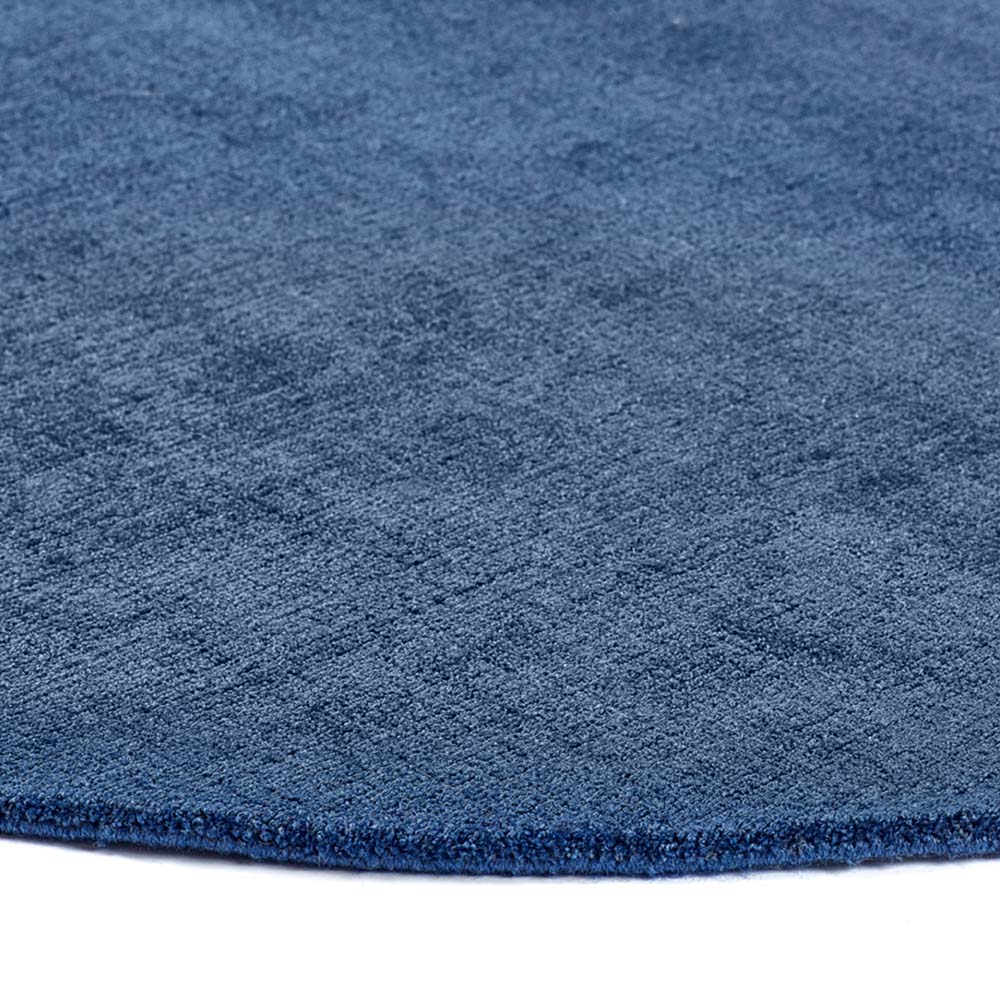 Reef Navy Rug made from 100% recycled materials in a solid dark blue colour.