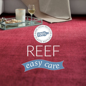 Reef Raspberry Rug made from 100% recycled materials in a solid dark pink colour.