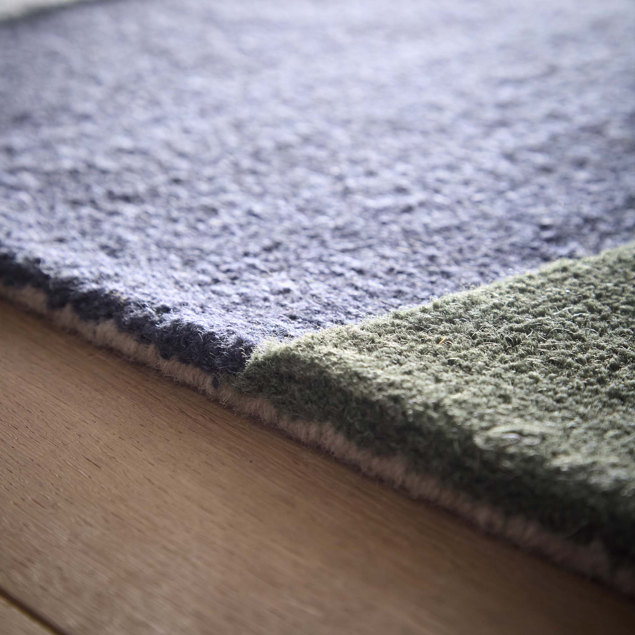 Close-up of Retro Deco Teal Wool Rug showing pile height.